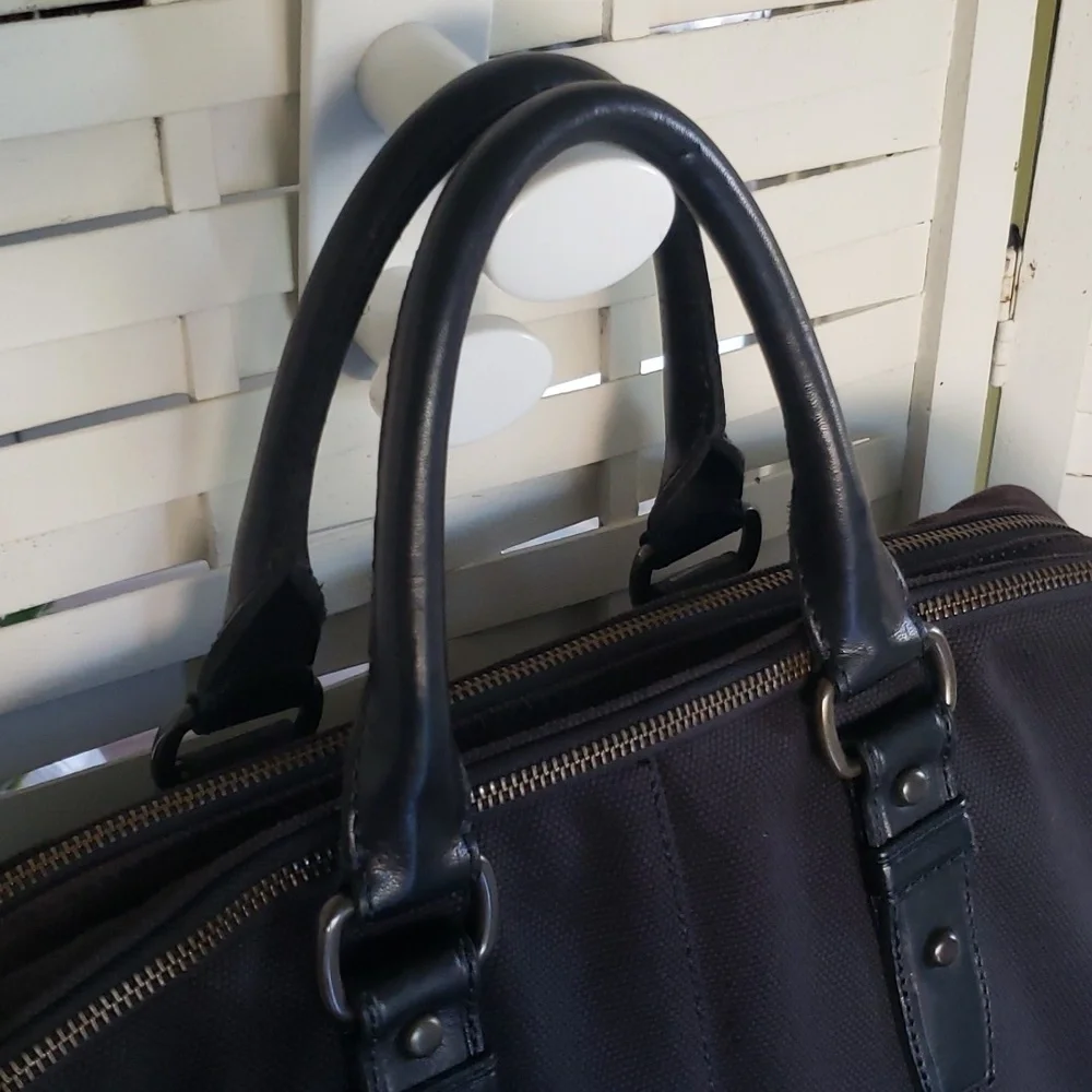 Fossil black canvas messages bag